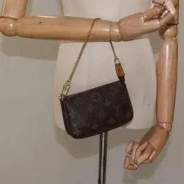 Authentic Louis Vuitton - Monogram Mini Pochette Accessories Bag Must Have